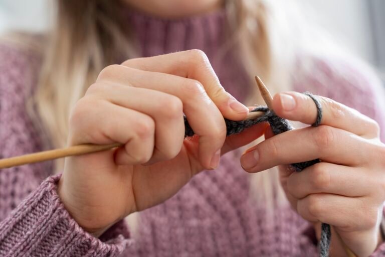 young-woman-knitting-while-relaxing